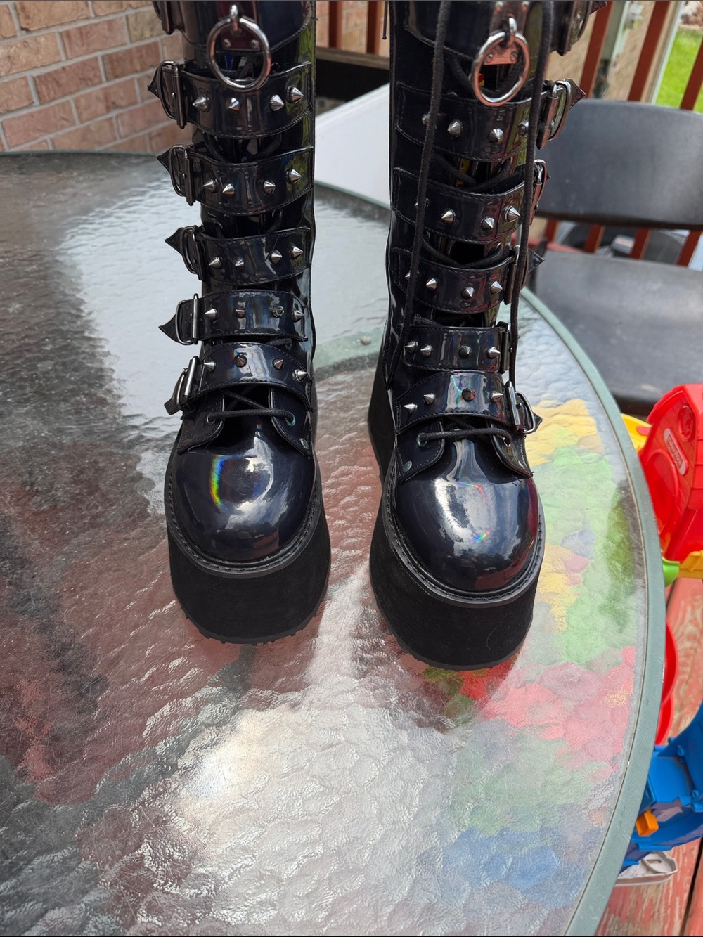 Demonia Black Patent Platform Combat Boots with Studded Straps. Vegan leather